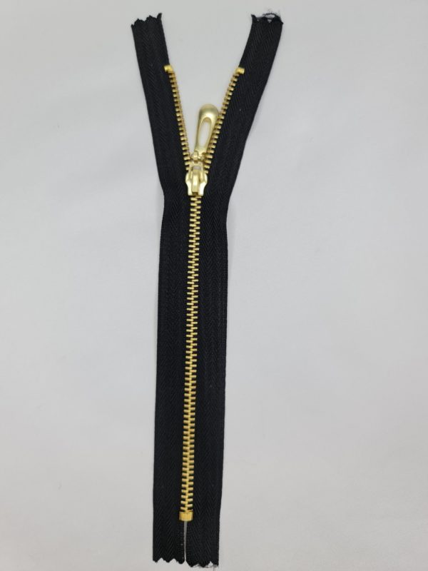 black and gold jean zip, decorative pull