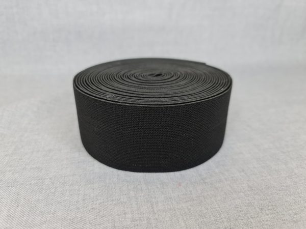 Elastic flat with a metallic thread in black colour 50mm