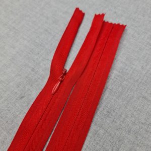 Invisible red fabric zip