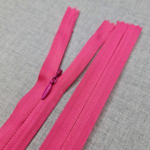 Invisible pink zip