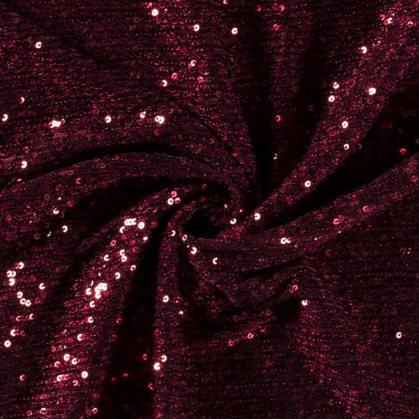 Sequinned fabric in red colour