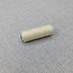 Thread in milk white colour 103