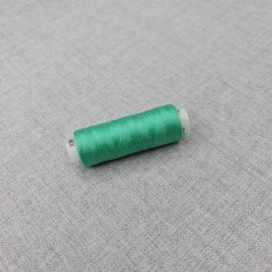 Thread in green colour 254