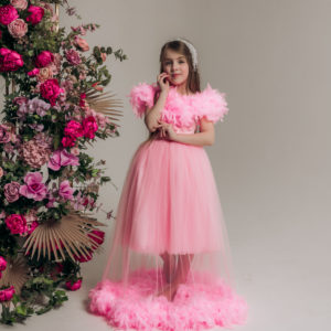 pink girls dress with feather